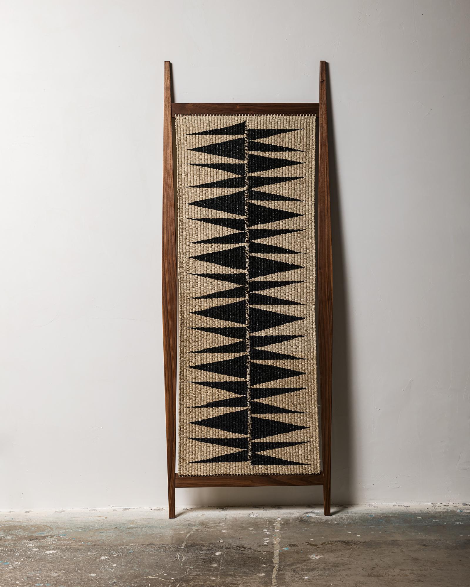 This limited edition series by Taryn Slawson features her elemental, hand-woven, hemp textiles framed in walnut or beech wood frames with a distinct minimal design. Two available in a series of 6.

Woven frames :: 29” x 78” / walnut wood, beech