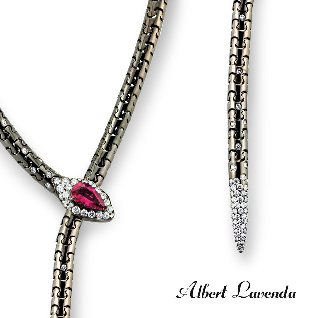 Flexible serpentine/snake necklace, set with tourmaline, ruby and diamonds in 18K gold black rhodium. Consisting of the snake pattern links simply and securely around the neck and can be adjusted to your desired length with ease. The end tip of the