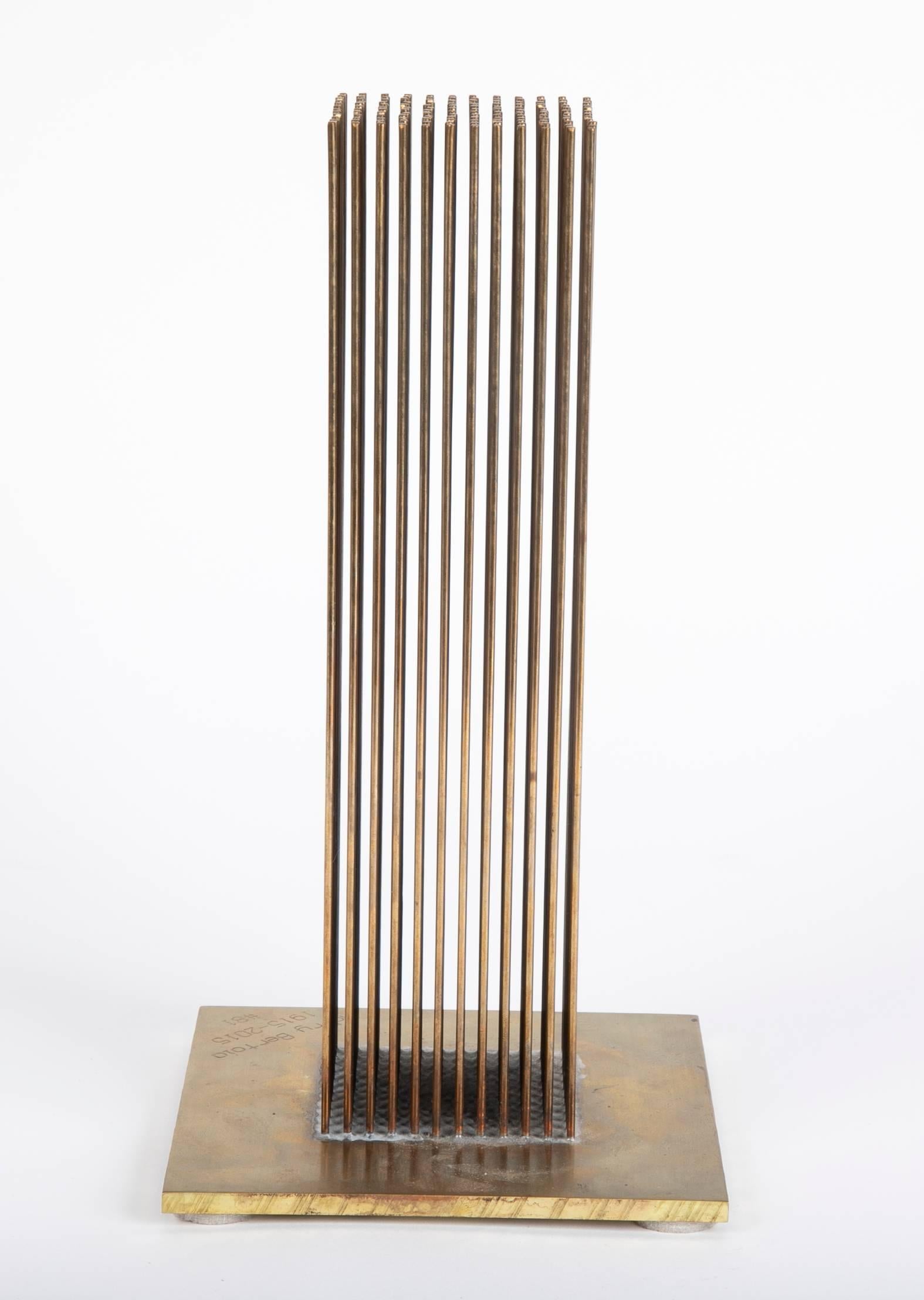  Originally designed by Harry Bertoia in 1970 this sonambient sculpture is #81 of a limited edition of 100 reproductions authorized by the Bertoia Estate and Bertoia Studio. The rods are bronze and silvered to a brass base and have a wonderful