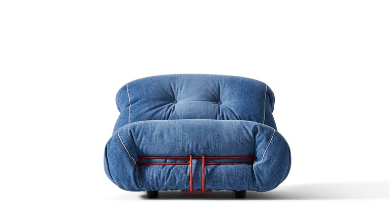 A design armchair with soft, generous contours, designed by Afra and Tobia Scarpa in the 1960s to bring home casual comfort, is swathed in premium Japanese denim, in a limited edition that elevates its unconventional spirit. The metal frame is