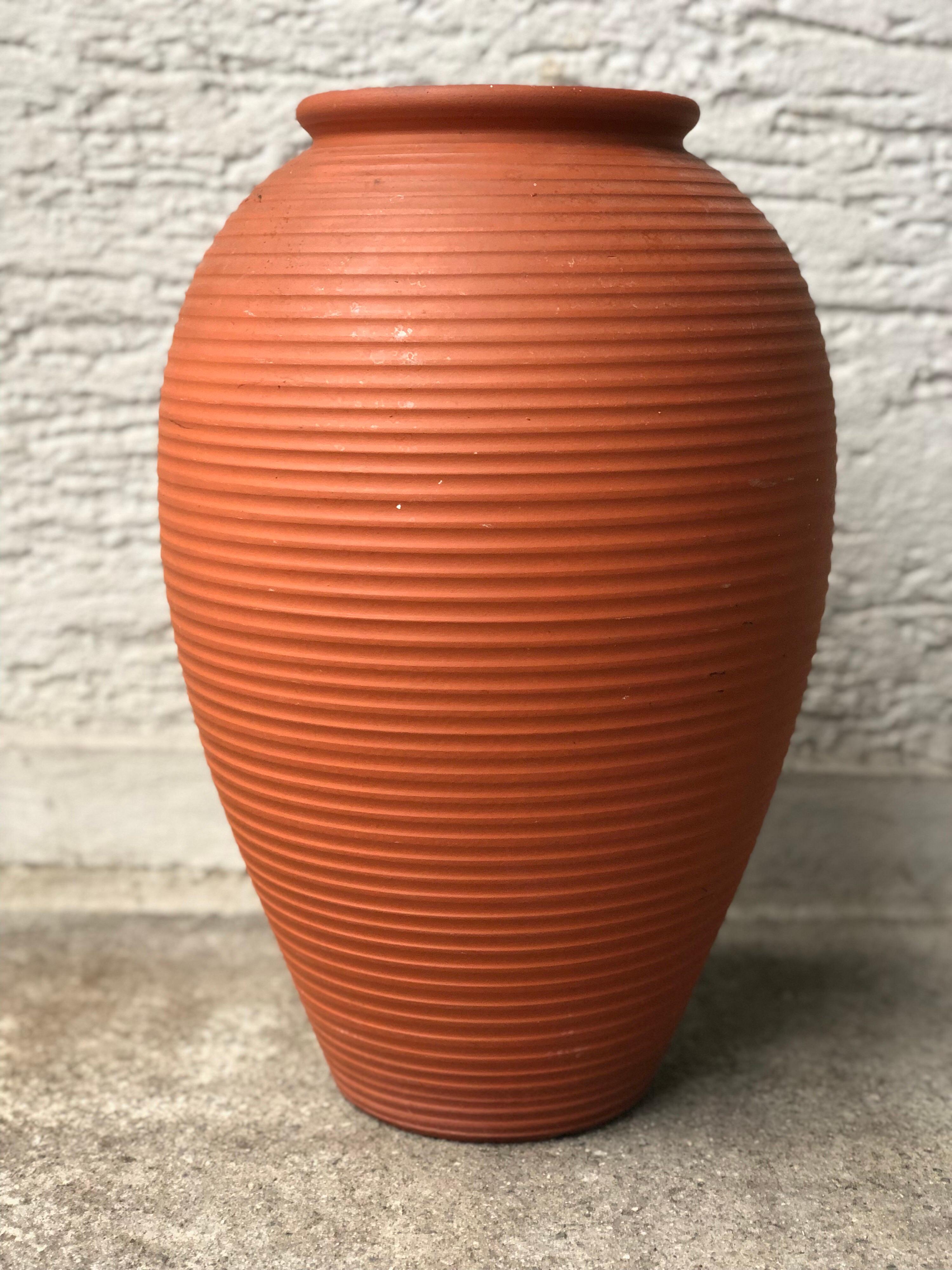 tall terracotta vase