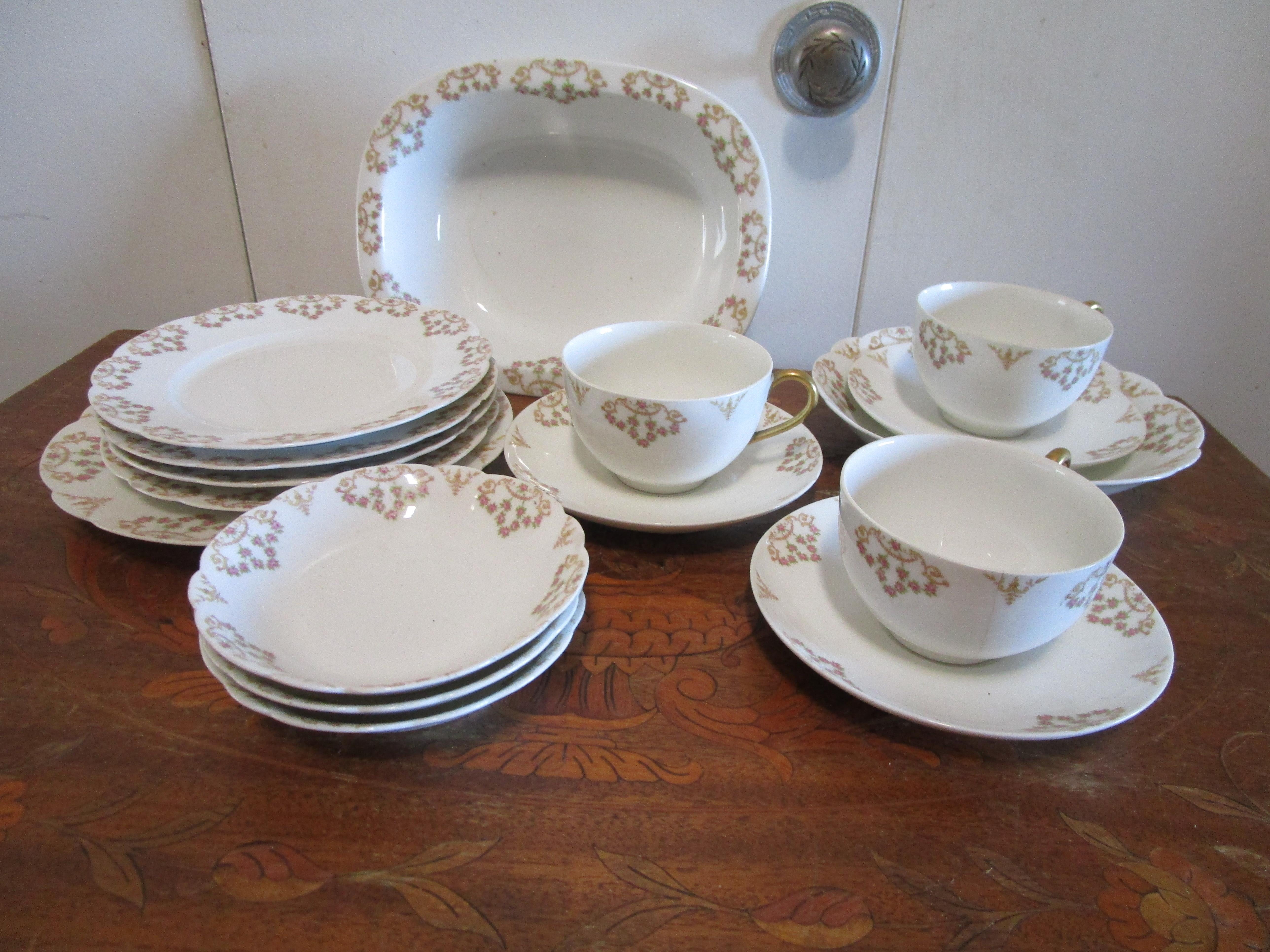 Beautiful antique pieces of Limoges china, elegant and near mint condition, can complete an existing set or complement an unrelated set of white china. Pattern is TRV087. This small collection of 17 pieces is exquisite. There are three cups with