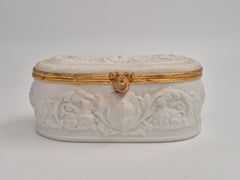 Limoges Bisque Trinket Box with Neo-Classical Relief with Cherubs.