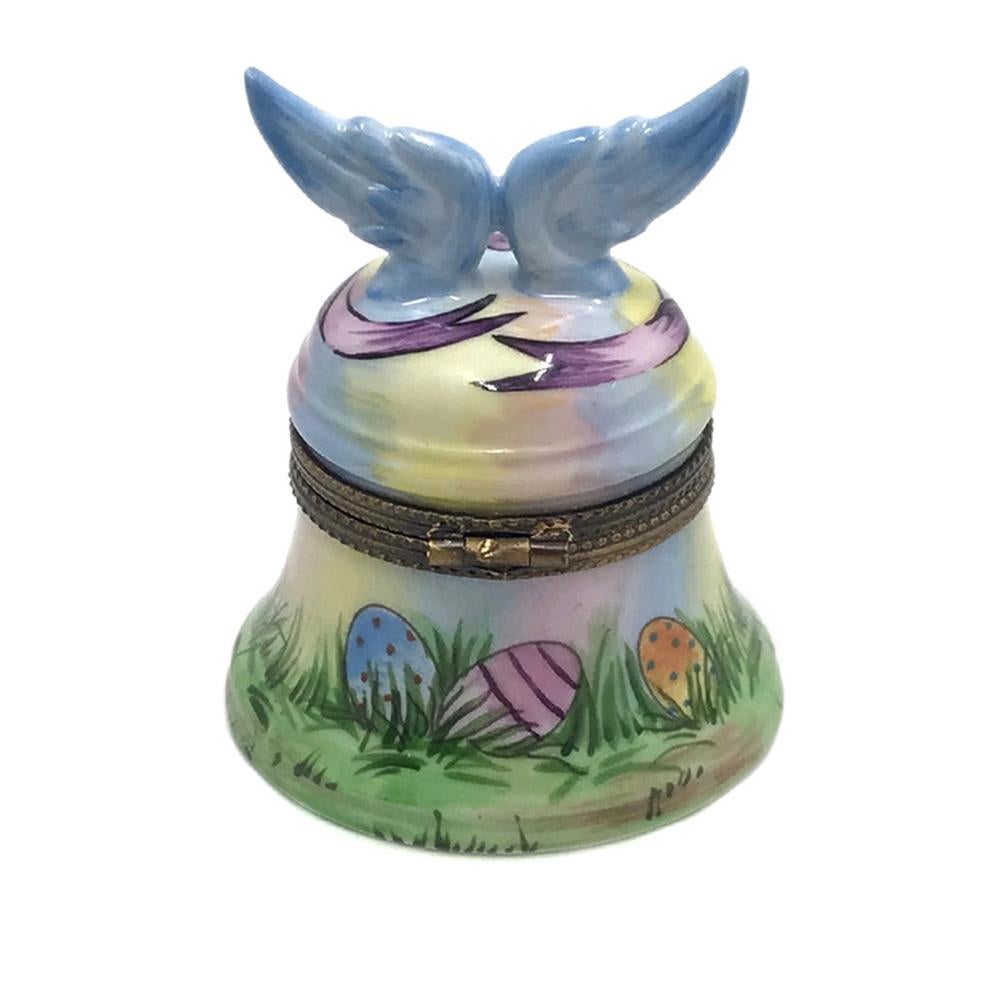 This is a fun Limoges Easter Egg Hunt trinket box.  It's a hand painted bell shaped box with a pair of angel wings and an egg hidden inside of the box. Signed 