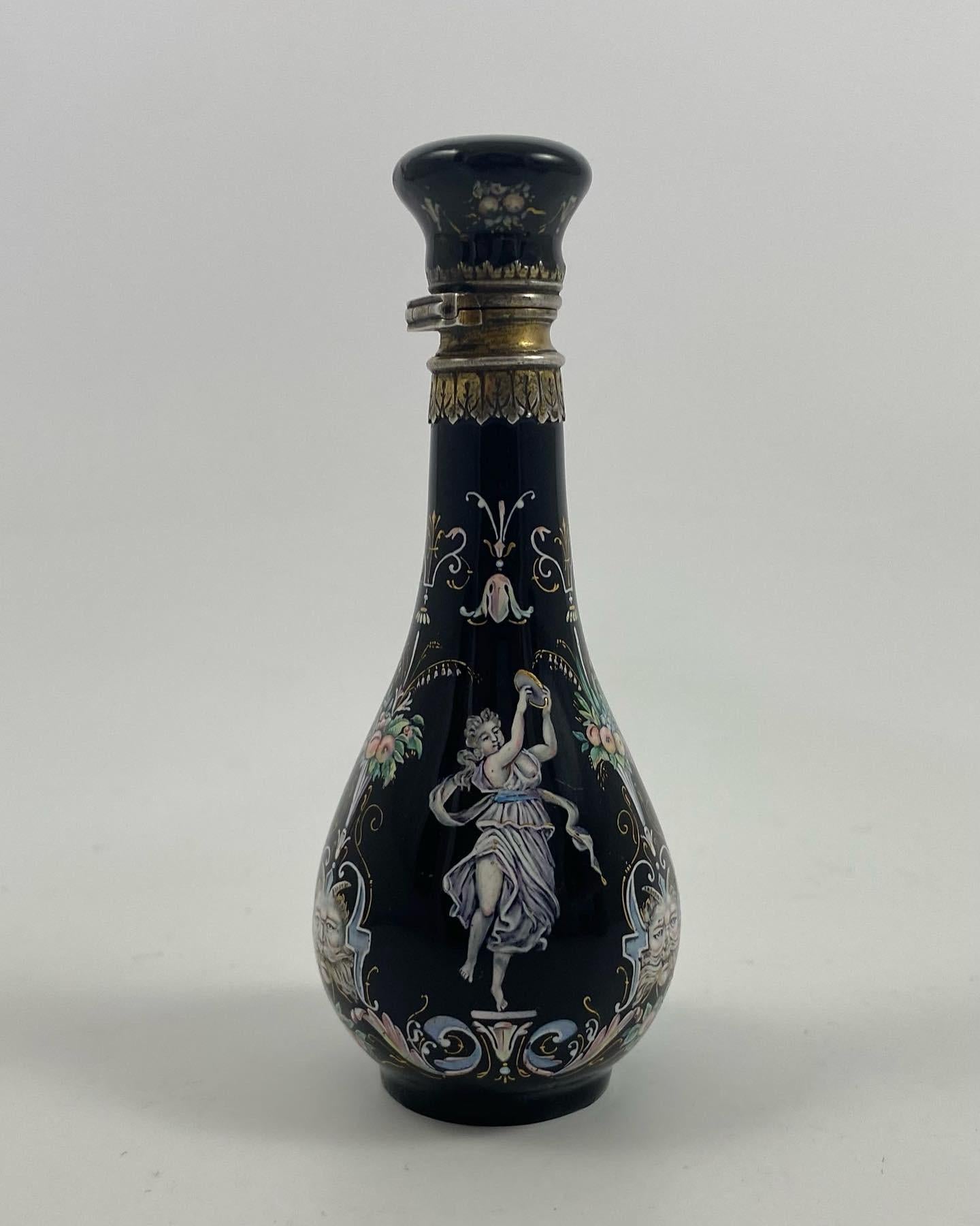 Limoges enamel scent bottle. Silver mounts, c. 1880.

£900.00
Limoges enamel scent bottle, with silver gilt mounts, c. 1880. The Lear shaped body, beautifully painted with Classical Maidens, dancing, whilst playing musical instruments.