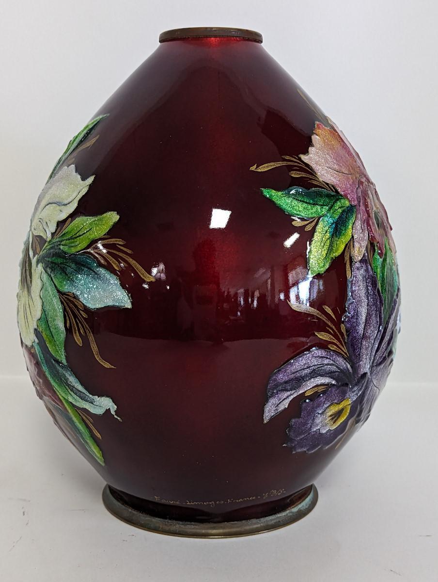 Absolutely stunning! Limoges vase by Camille Fauré, Circa 1930, Enamel over copper, Raised floral, design, Bulb shaped, Rich Reddish-burgundy background, Signed lower bottom: – Fauré – Limoges – France – No 3/8 -. Underneath vase are a couple of