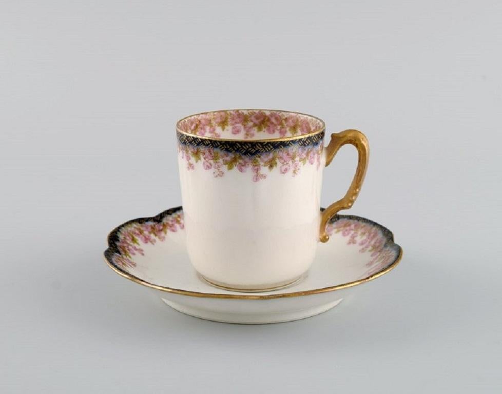 Limoges, France. 10 mocha cups with saucers in hand-painted porcelain. 
Pink flowers and gold edge. 1930s.
The cup measures: 6 x 5.4 cm.
Saucer diameter: 11 cm.
In excellent condition.
Stamped.