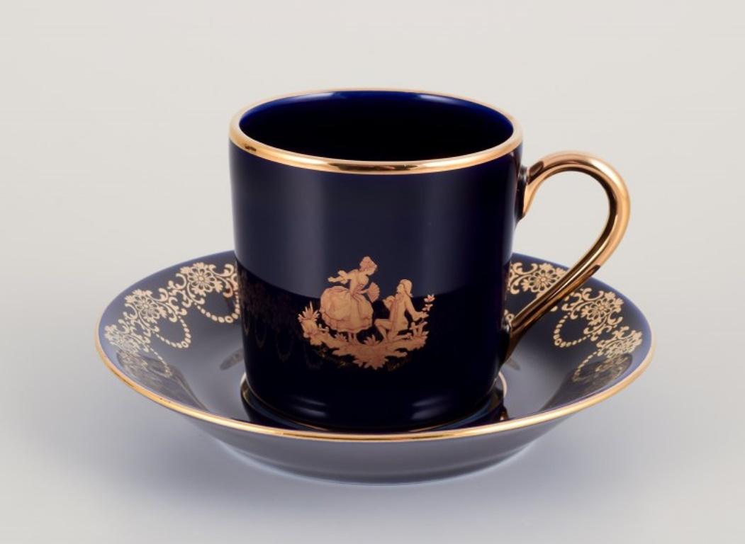 French Limoges, France. Coffee cup, sugar bowl, and creamer in porcelain. For Sale