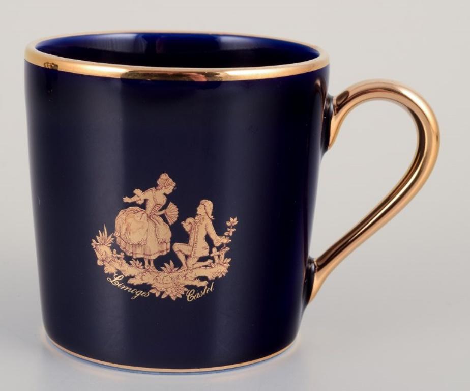 Glazed Limoges, France. Coffee cup, sugar bowl, and creamer in porcelain. For Sale
