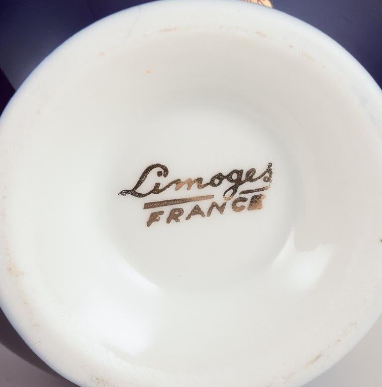 Porcelain Limoges, France. Coffee cup, sugar bowl, and creamer in porcelain. For Sale