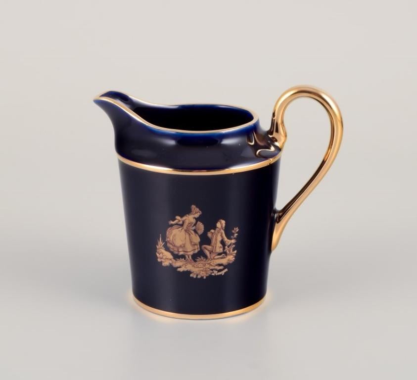 Limoges, France. Coffee cup, sugar bowl, and creamer in porcelain. For Sale 1