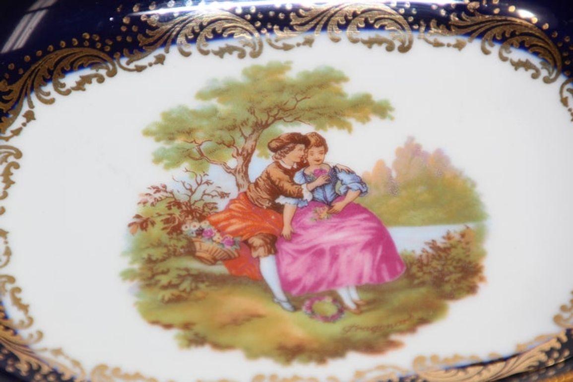 Louis XIV Limoges France Dish in Royal Blue with Fragonard Couple and Fine Gold Metal Trim For Sale