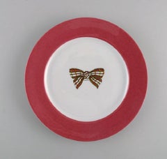 Limoges, France, Five Christian Dior Porcelain Plates Decorated with Bow