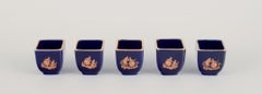 Limoges, France. Five miniature porcelain vases decorated with gold leaf.