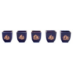Vintage Limoges, France. Five miniature porcelain vases decorated with gold leaf.