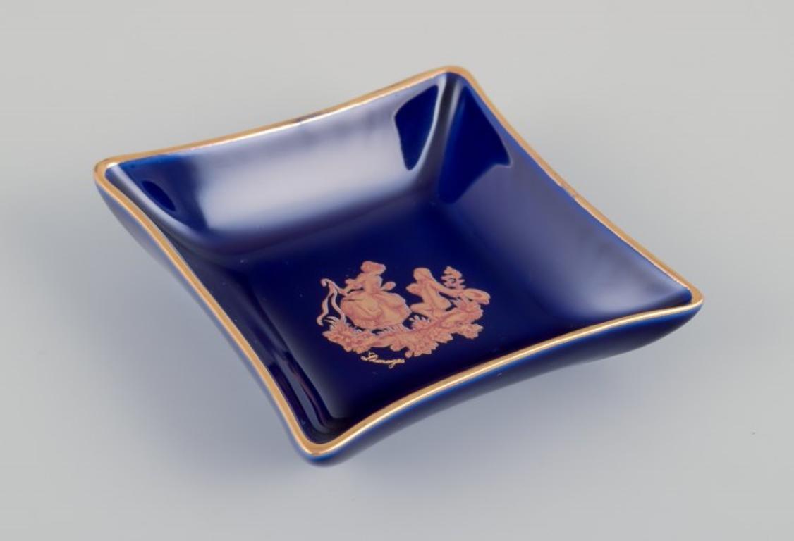 Late 20th Century Limoges, France. Five pieces of porcelain including small trays and bowls For Sale