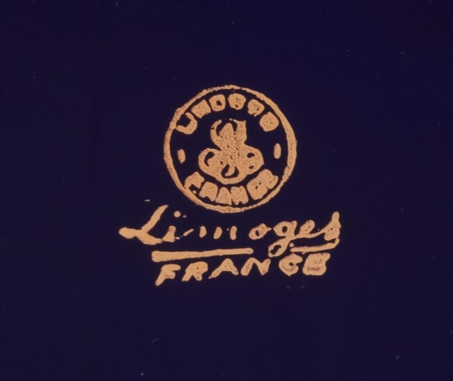 Limoges, Francia. Cuatro platos de porcelana decorados con pan de oro de 22 quilates. finales del siglo XX en venta