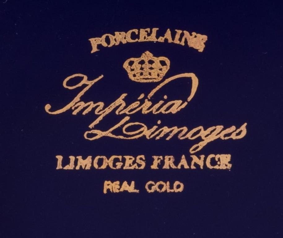 Limoges, Francia. Cuatro platos de porcelana decorados con pan de oro de 22 quilates. Porcelana en venta