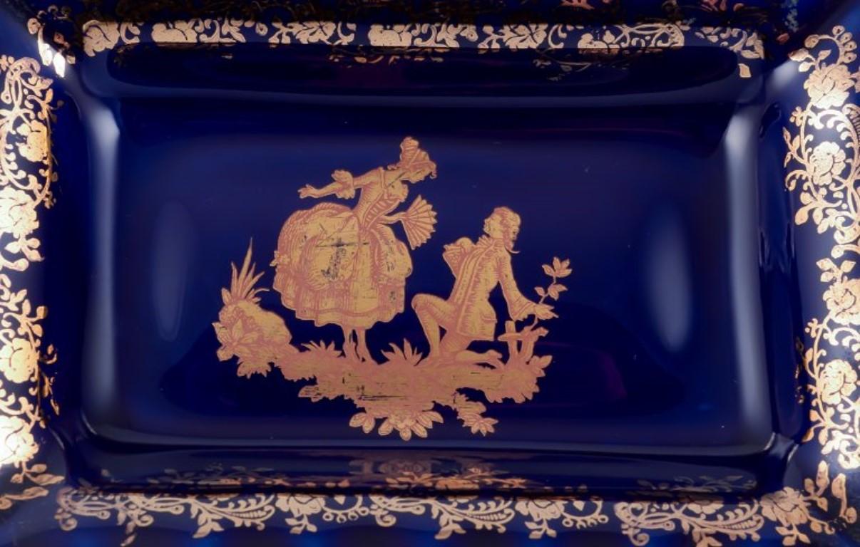 Glazed Limoges, France. Porcelain covered box decorated with 22-karat gold leaf. For Sale