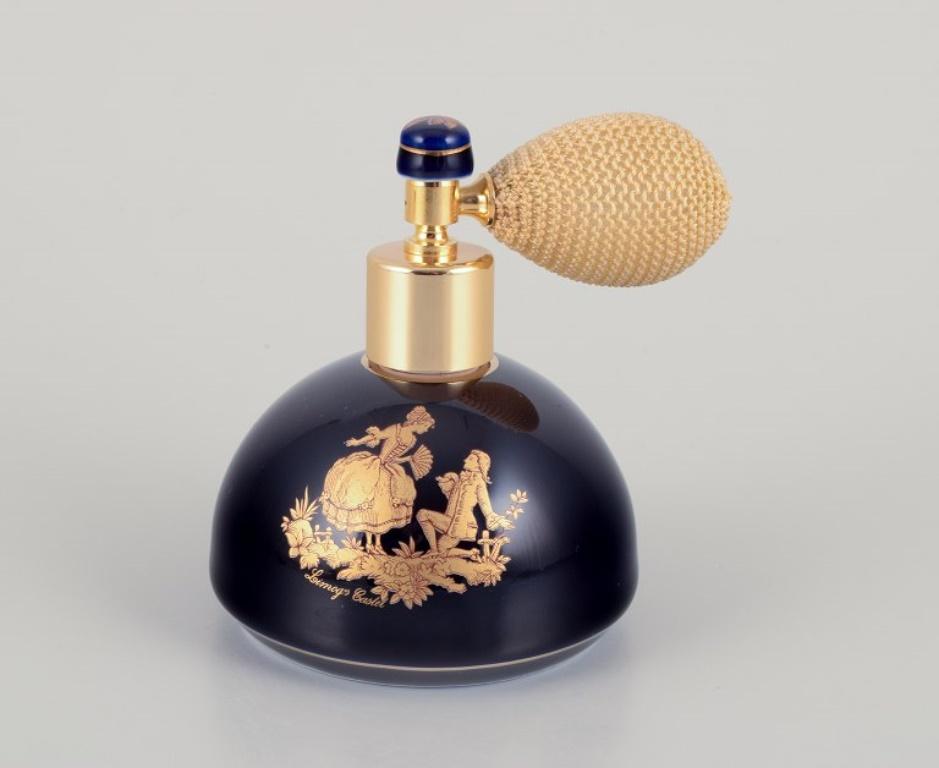 Limoges, France. Porcelain perfume atomizer and makeup mirror decorated with 22-karat gold leaf and a beautiful royal blue glaze. Scène galante. 
Approximately 1970.
Provenance: From a large French private collection of Limoges porcelain.
Marked.
In