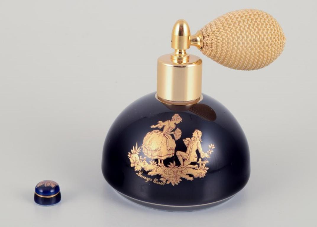 French Limoges, France. Porcelain perfume atomizer and makeup mirror.