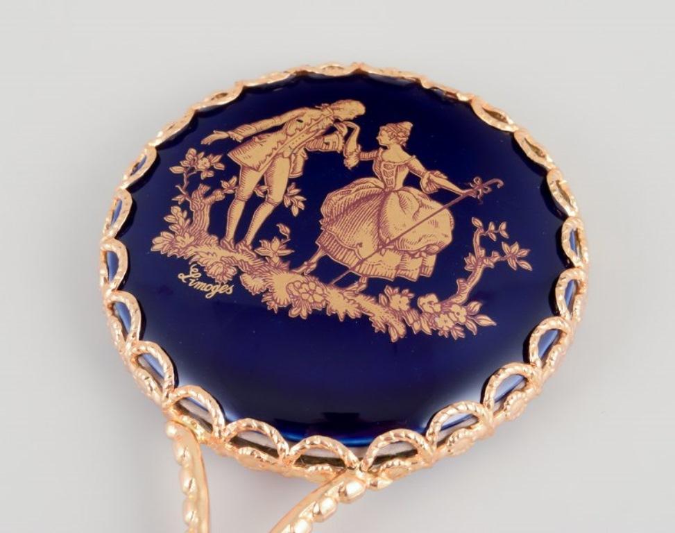 Limoges, France. Porcelain perfume atomizer and makeup mirror. 2