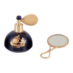 Limoges, France. Porcelain perfume atomizer and makeup mirror.