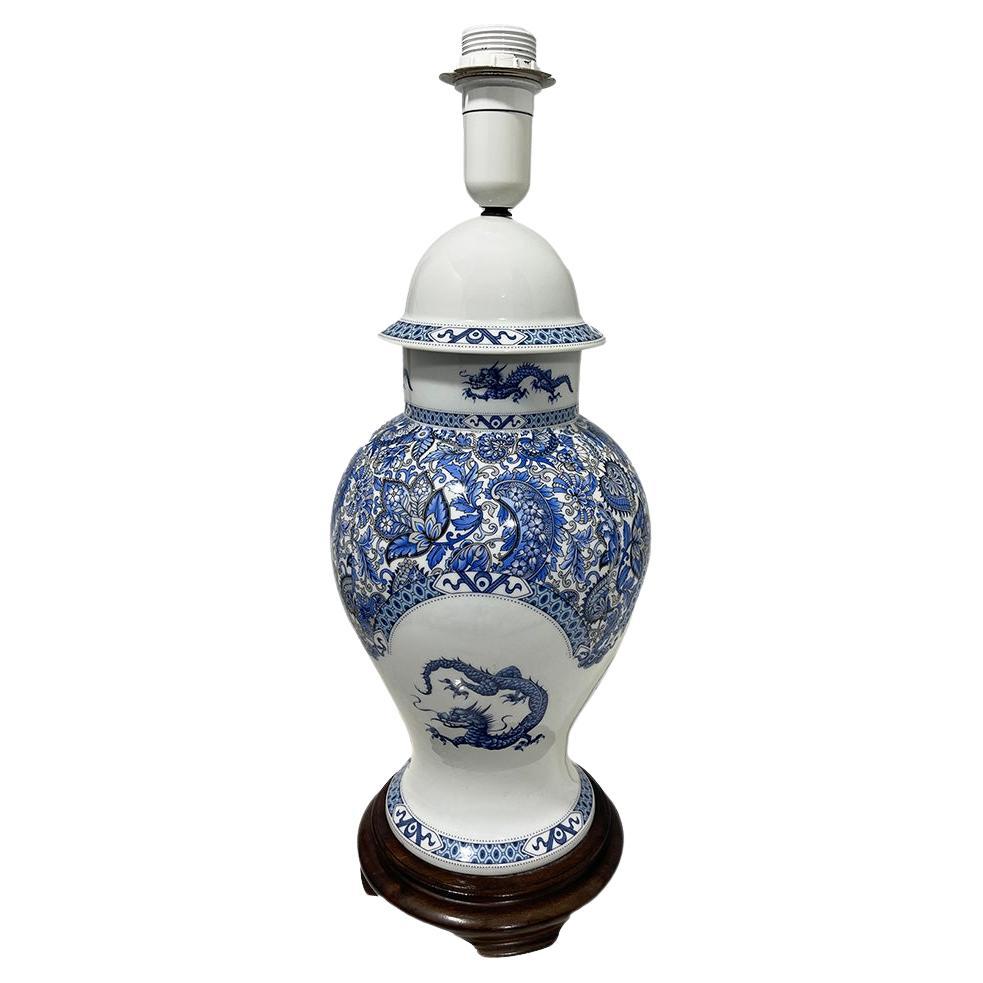 Limoges France porcelain table lamp with blue dragon, 20th century For Sale