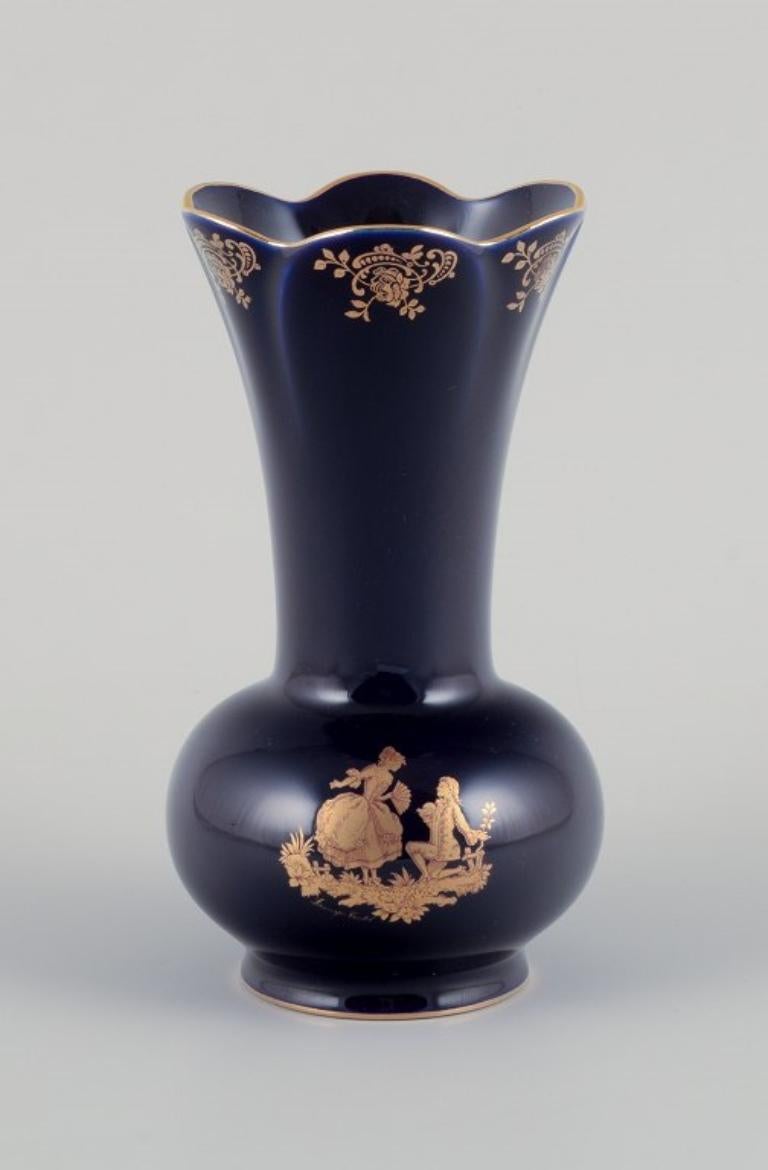 Limoges, France. Three porcelain vases decorated with 22-karat gold leaf. In Excellent Condition In København, Copenhagen