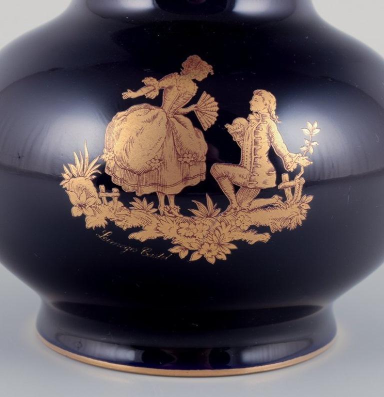Late 20th Century Limoges, France. Three porcelain vases decorated with 22-karat gold leaf.