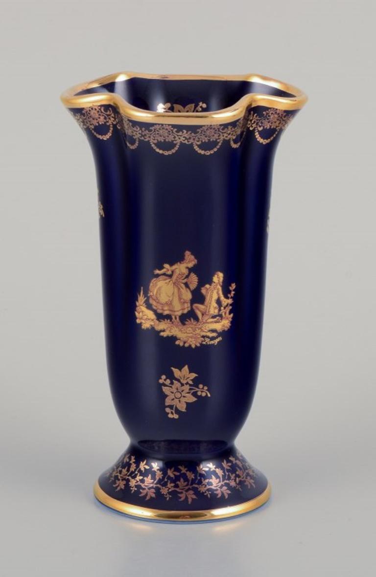 Limoges, France. Three porcelain vases decorated with 22-karat gold leaf. 1