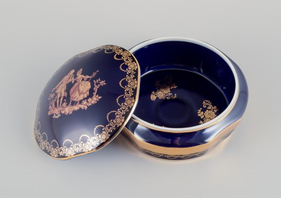 Limoges, Francia. Dos cajas / jarras de porcelana decoradas con pan de oro de 22 quilates Francés en venta