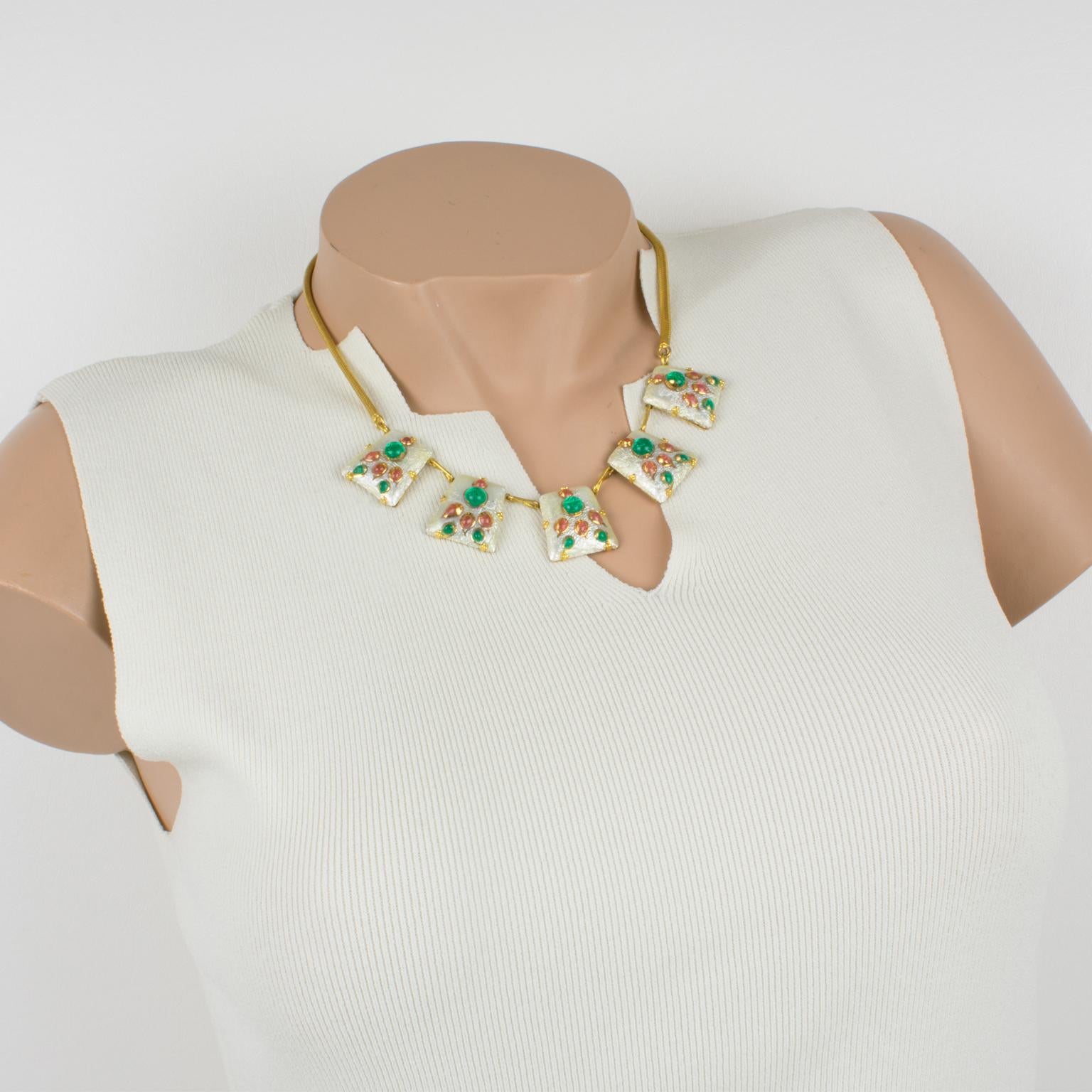 An exquisite enamel and pate de verre link necklace designed in Limoges, France. Enameled domed trapeze copper elements are linked together with gilt metal framing to a turbogas or serpentine chain. This popular 1950s and 1960s technique named