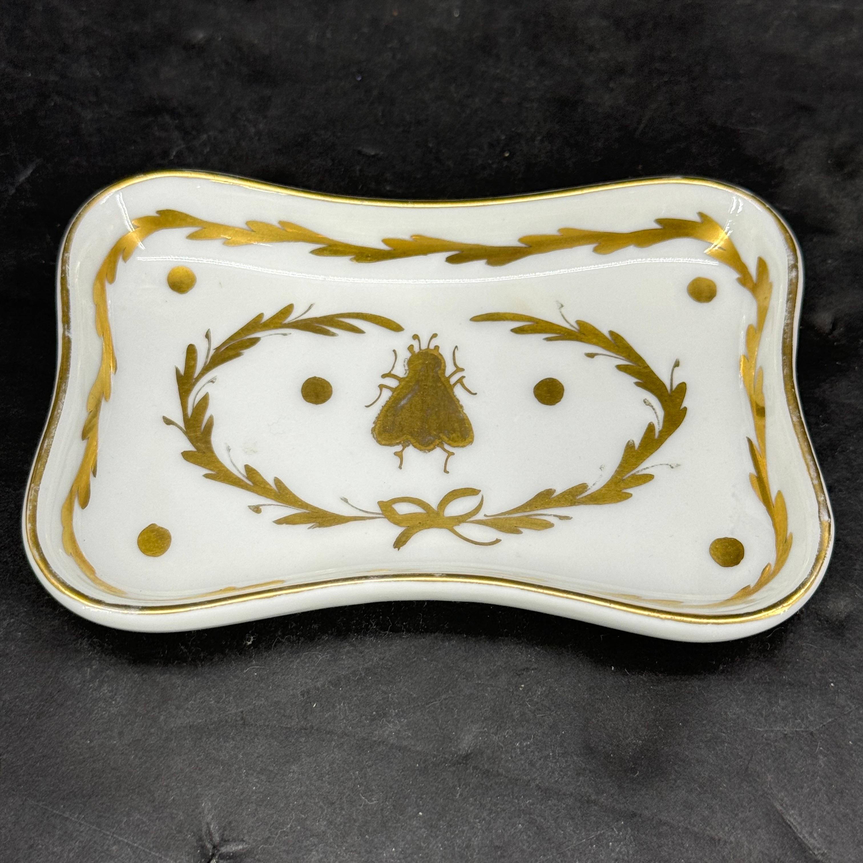 Charming Limoges French Bee Trinket Tray. As found in France, this piece features a hand painted Bee with gilt detailing. This piece would certainly be a fantastic addition to an existing collection of these desirable small trinket trays, most often