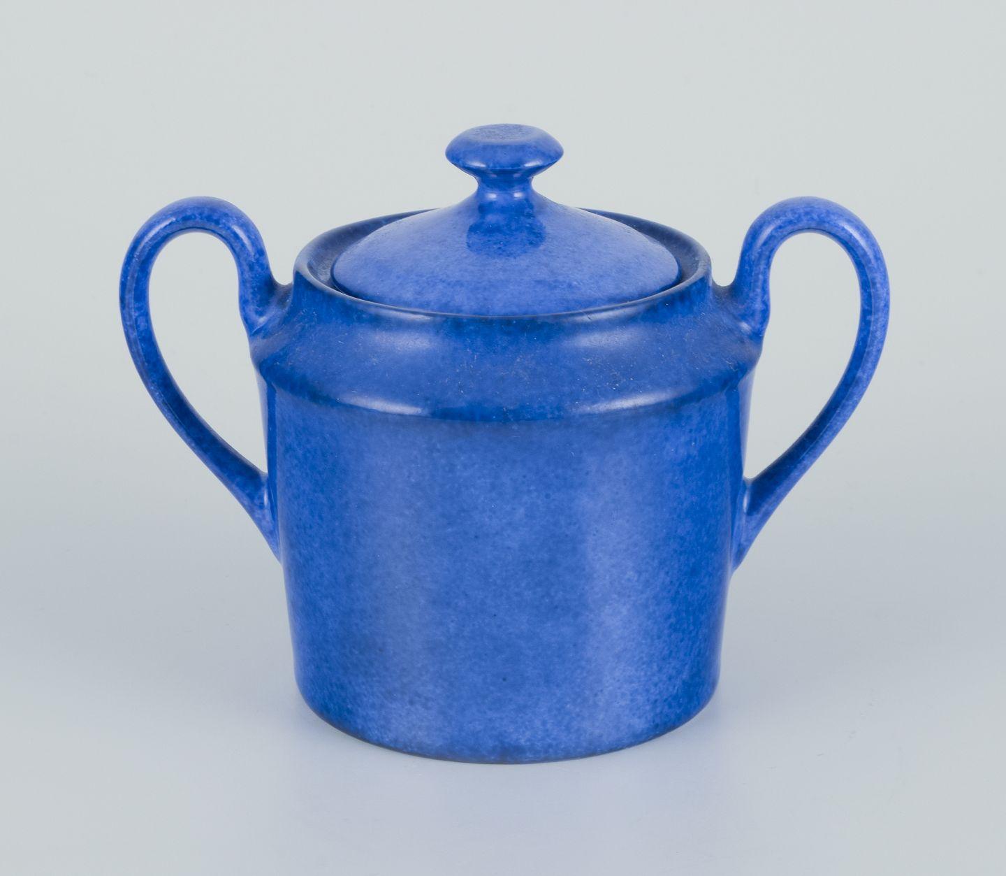 Pre-owned goods are exempt from import duties for U.S. customers. 
Therefore, no import tariffs will be applicable to your purchase.

Limoges / Laure Japy, Paris.
Six coffee cups and a sugar bowl in porcelain.
Decorated with fruits.
Dating: