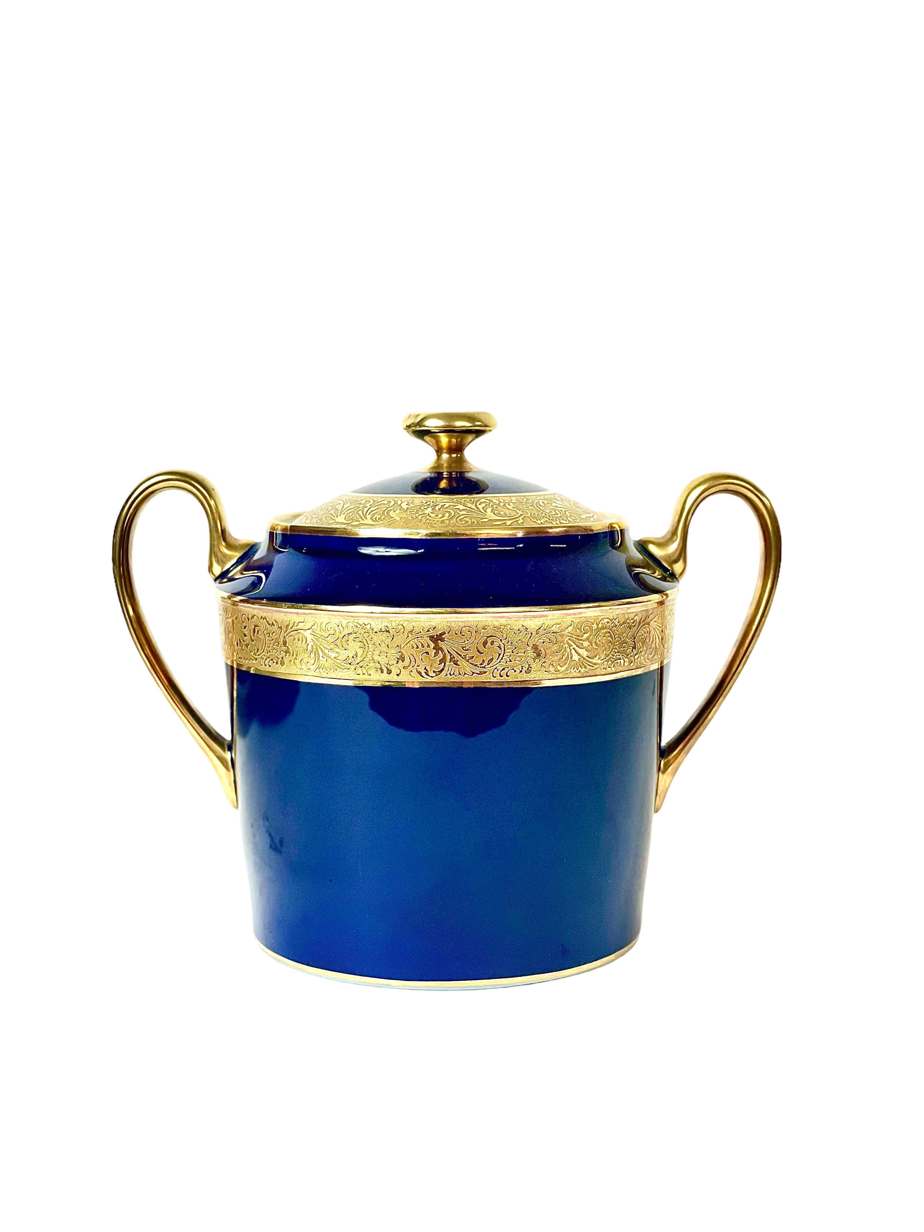 French Limoges Porcelain Service Glazed in an Opulent Royal Blue with Gilt Edges For Sale
