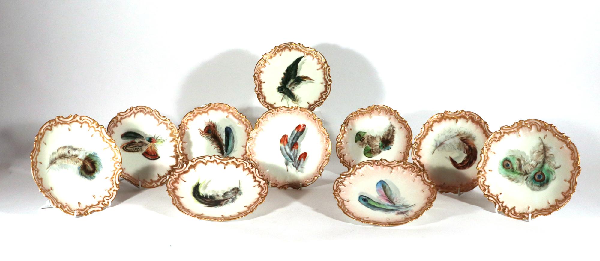 Limoges Porcelain Dessert Plates decorated with Feathers,
Set of Ten,
1891-1900

The Limoges porcelain plates are each painted with bird feather decoration, some with a single feather and some with multiple feathers.  The rim is shaped and molded