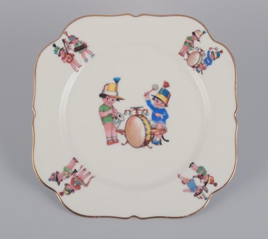 Porcelana de Limoges. Tres platos de porcelana con motivos de niños músicos en venta 1