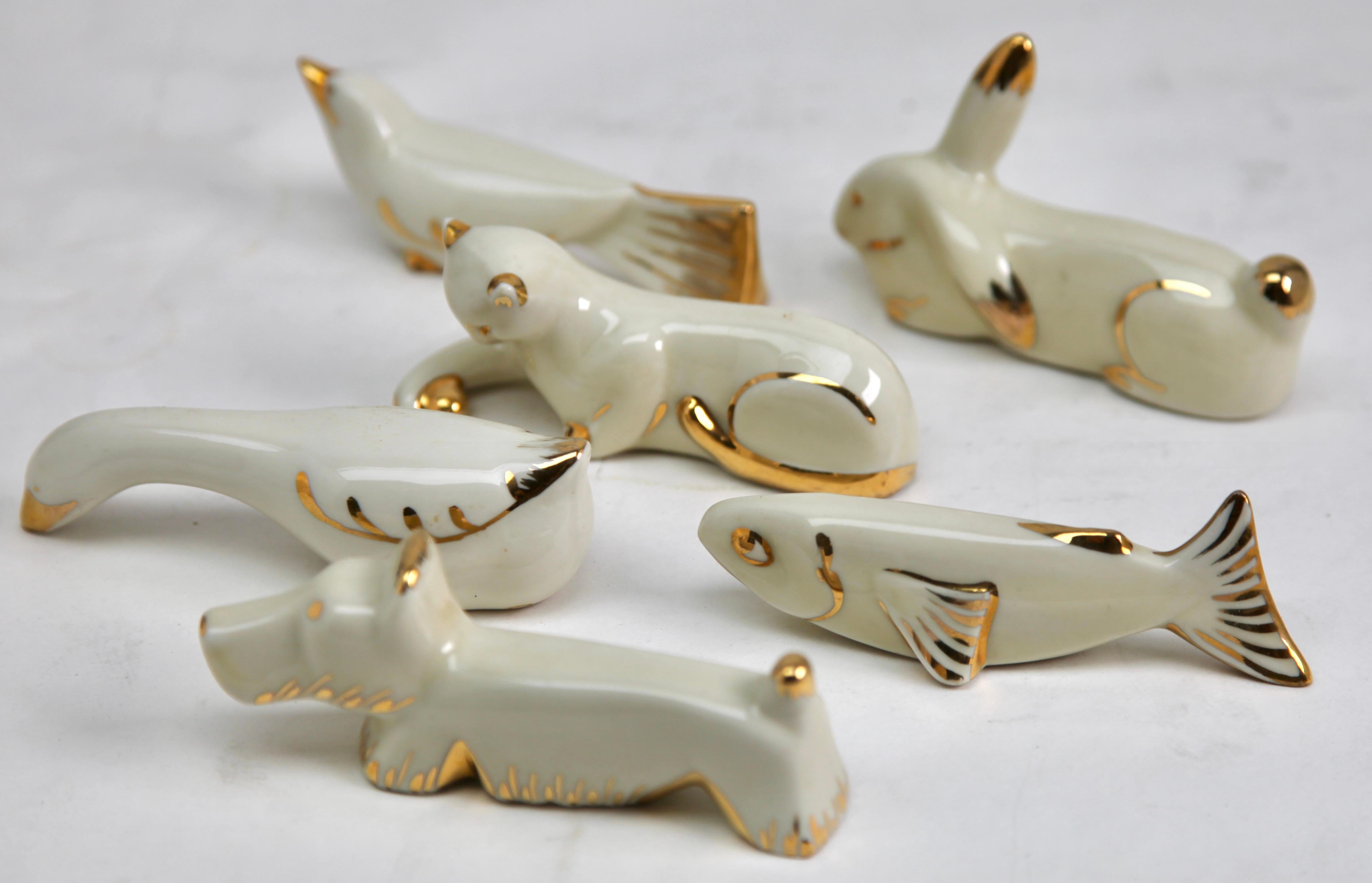 Limoges 'Signed' France Knife Rests, Set of 12 Pieces 
2 Pieces of each Animal
This is a set of 12 pieces in porcelain with hand-applied gold highlights bearing the decorator's mark.
Cute additions for a formal table.
Limoges is one of the best