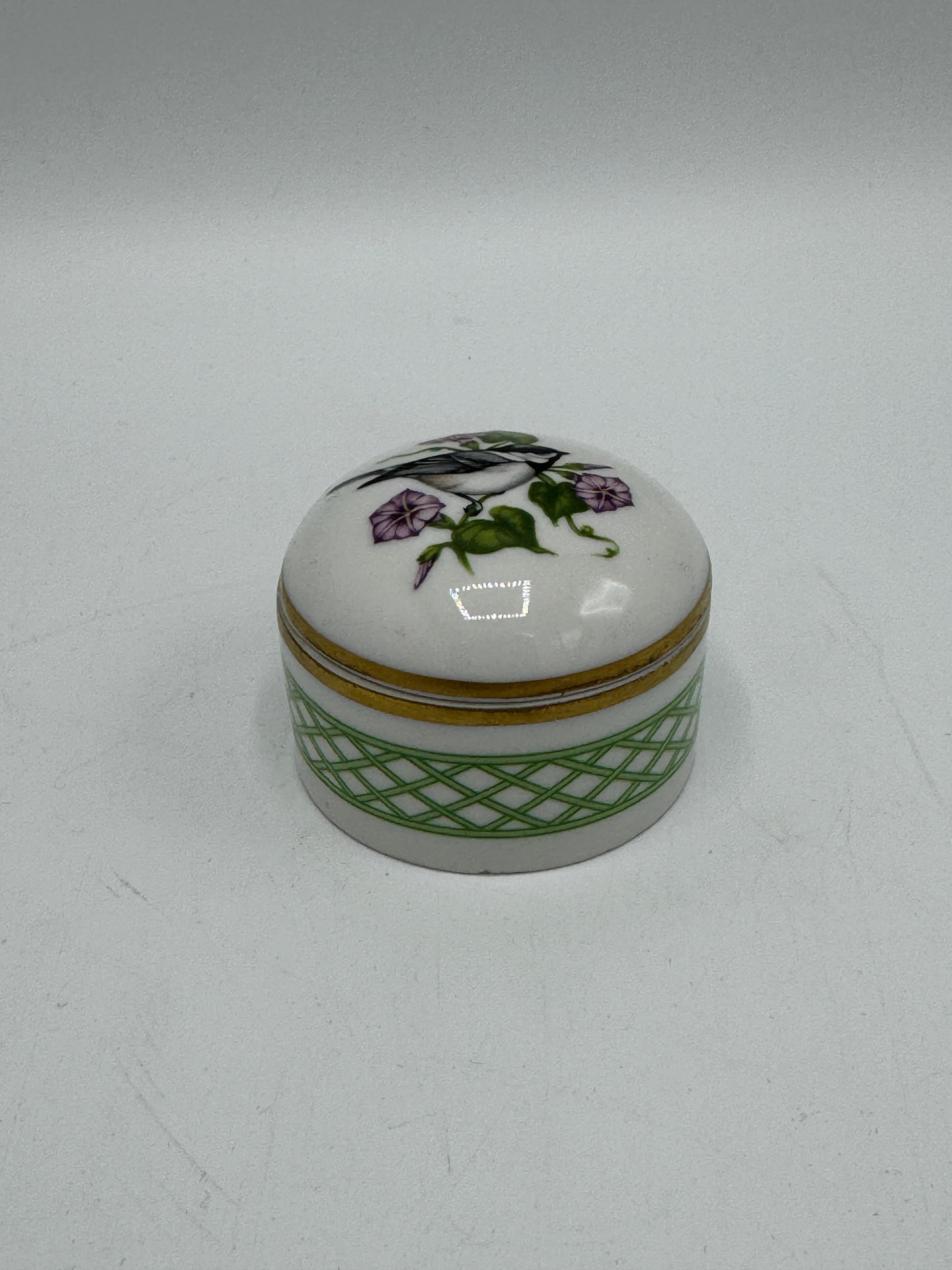 Offered is a beautiful, Early 21st Century, Limoges porcelain box from 