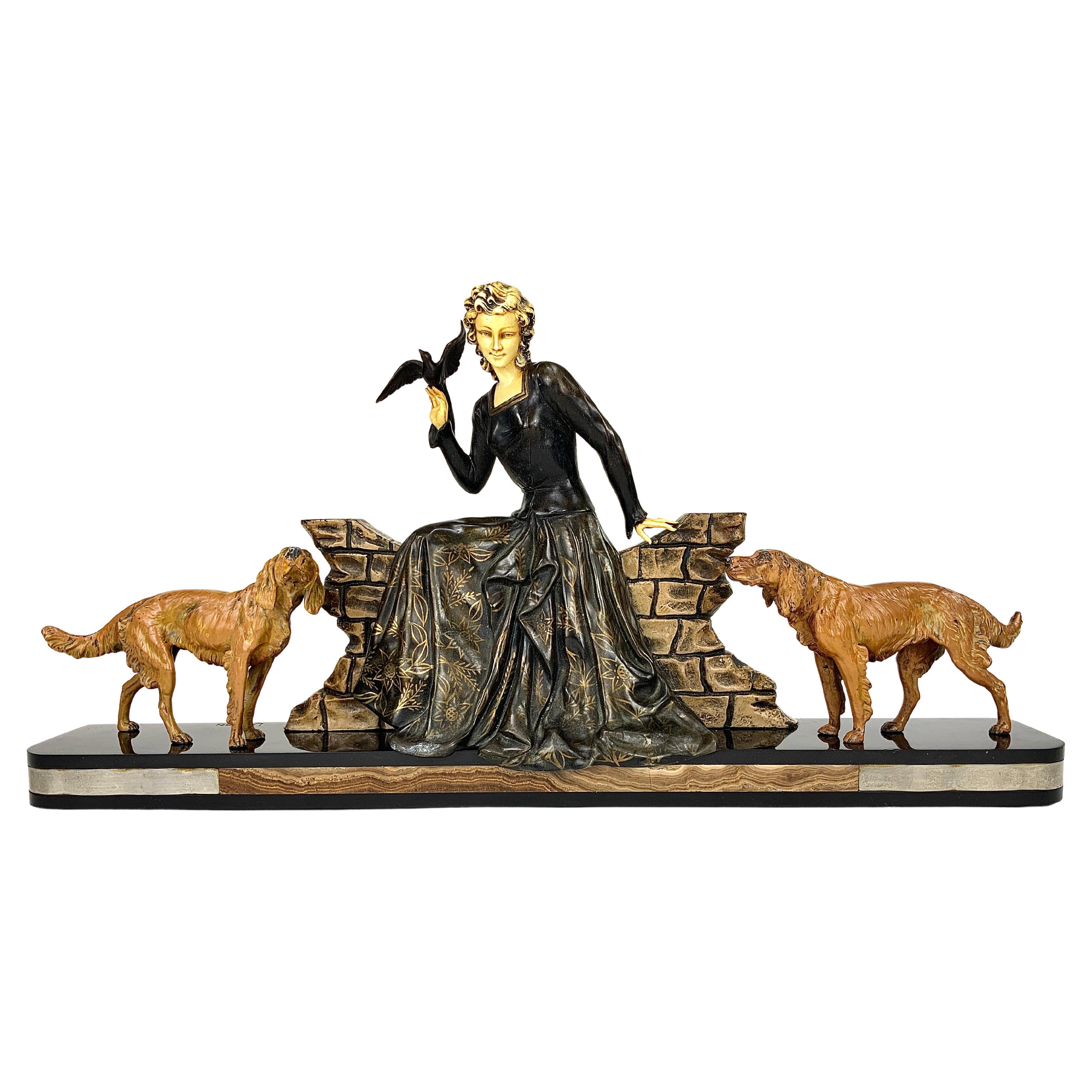 Limousin Art Deco Sculpture "Woman and Her Two Dogs", circa 1930s For Sale