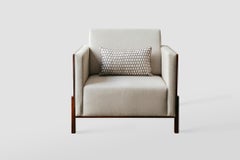 Minimalist "Lina" armchair in upholstered fabric and natural wood sides