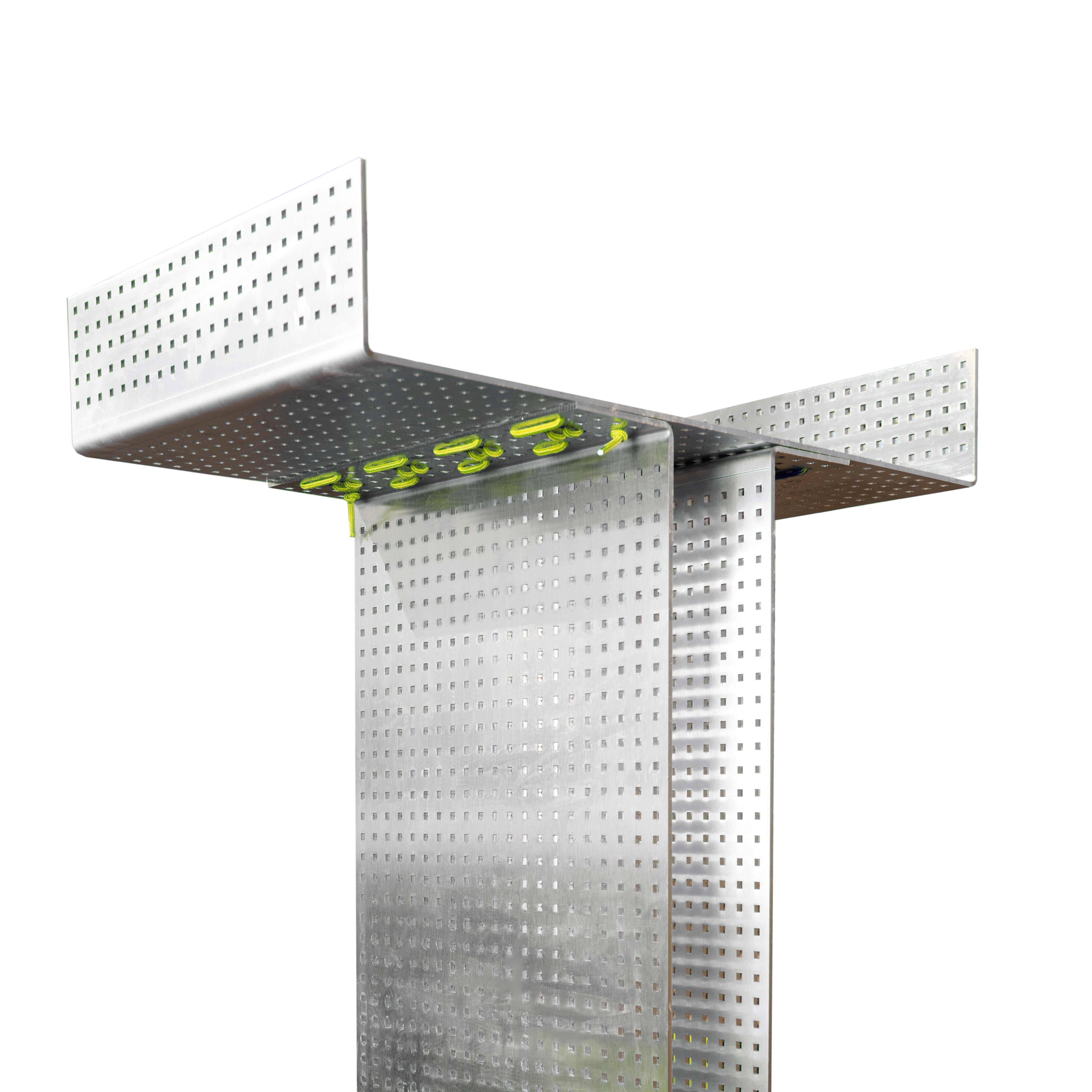 Stainless steel coffee table with green strings.1416
a piece of furniture that is defined by its user. Lina tries to find the essence of itself. A monolith made up of 4 slabs sewn together becomes a seat or a small table or they can be stacked and