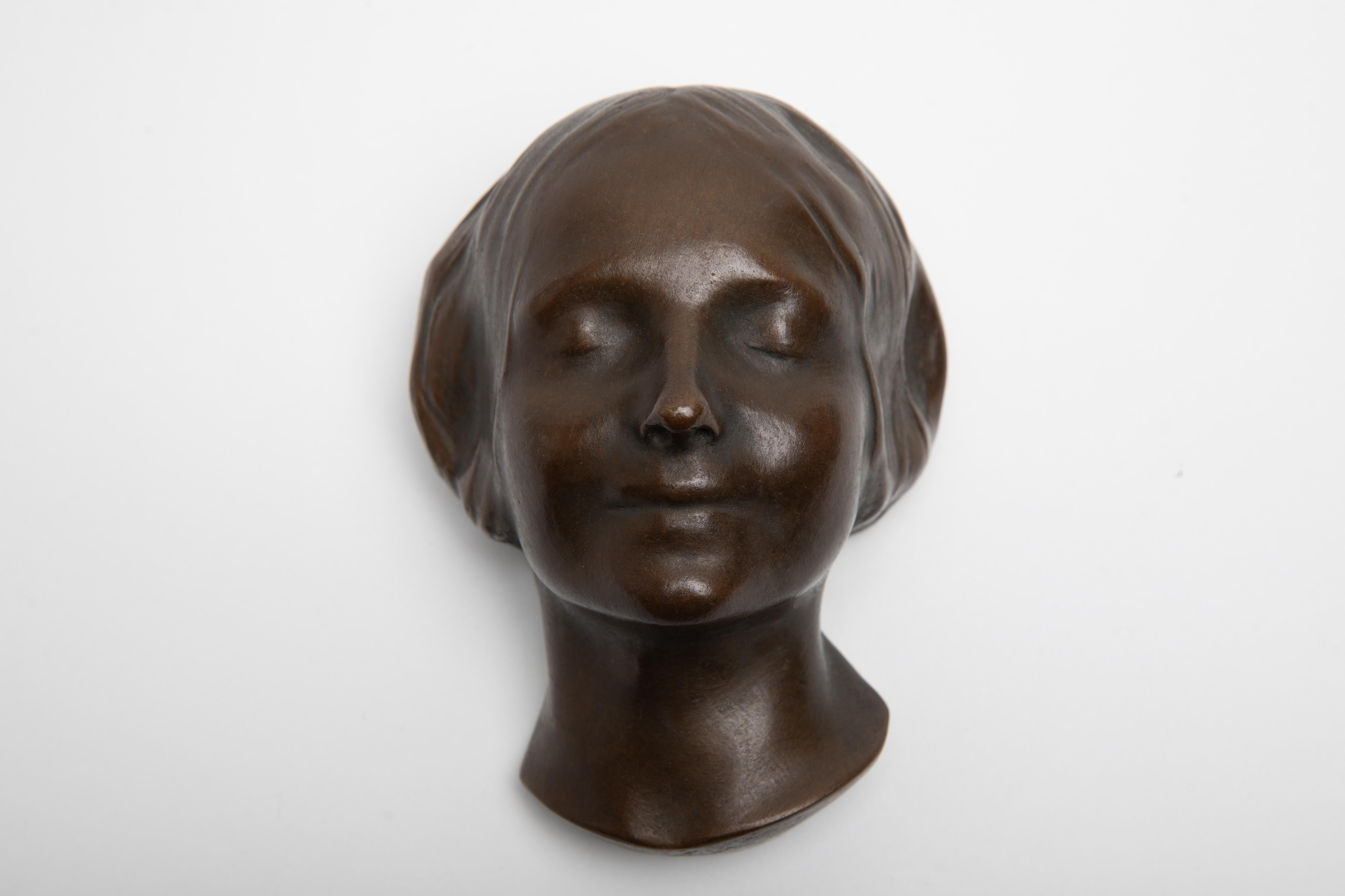 L'Inconnue de la Seine or The Unknown Woman of the Seine (1900 - 1920)

The bronze likeness of a young girl found drowned in the Seine river in the late 19th century. The subject of considerable legend, identical examples in plaster, marble, bronze
