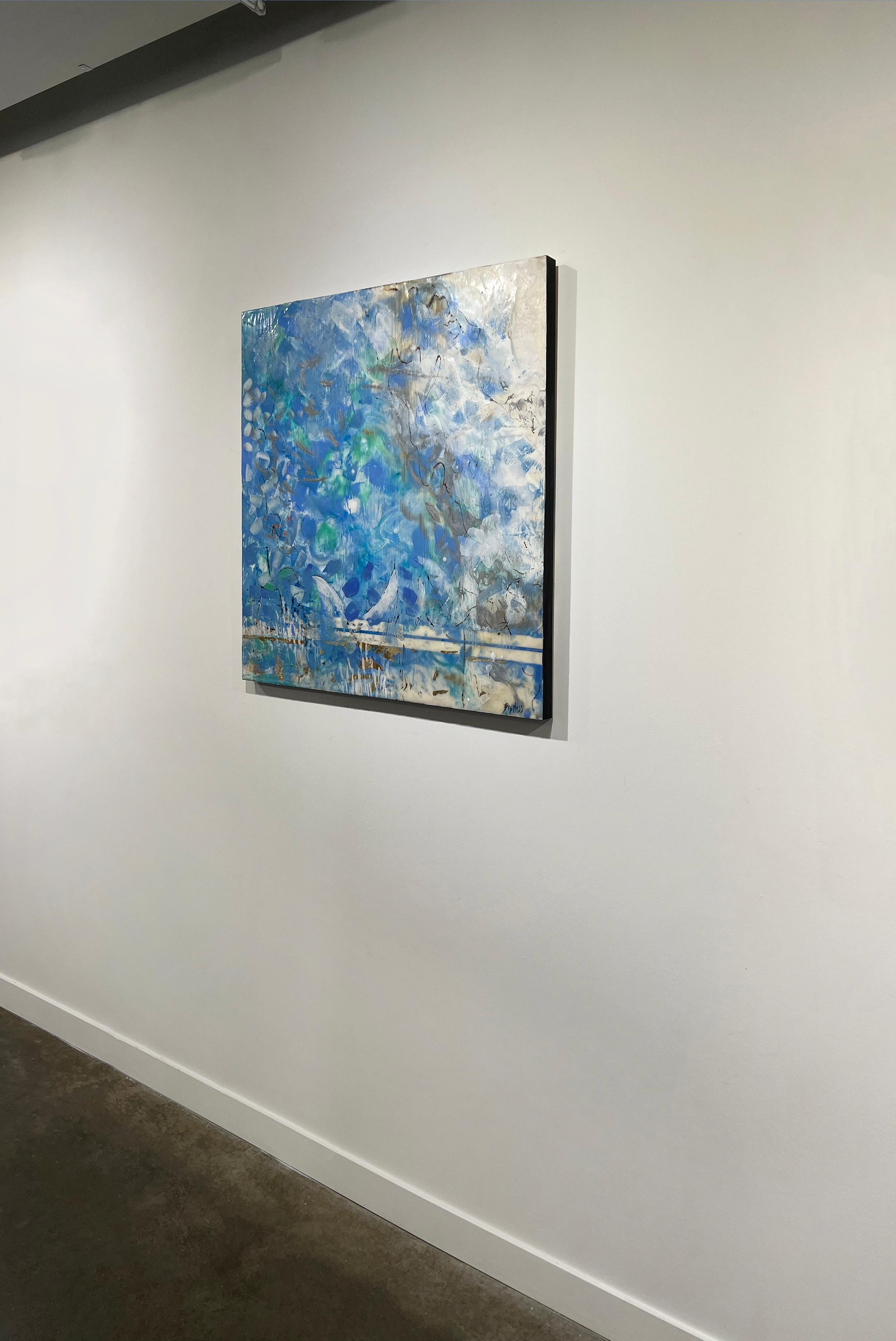 This abstract floral encaustic painting by artist Linda Bigness features a cool blue palette with metallic gold leaf accents. The painting is made with encaustic and gold leaf on board, and has painted black sides. It is signed by the artist in the