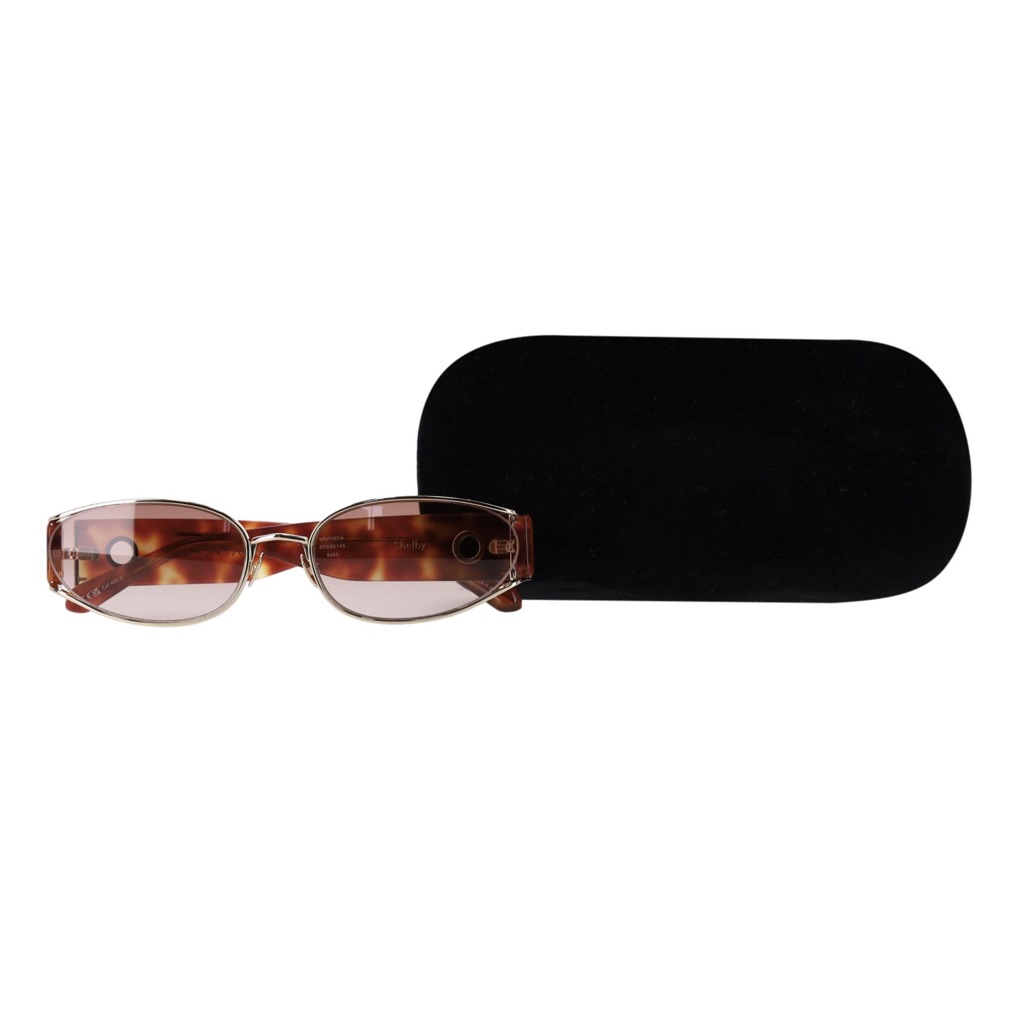Linda Farrow 22k vergoldete Shelby Sonnenbrille mit Schildpattbügeln 

In Zusammenarbeit mit Annie's Ibiza wurde diese braun-goldene 