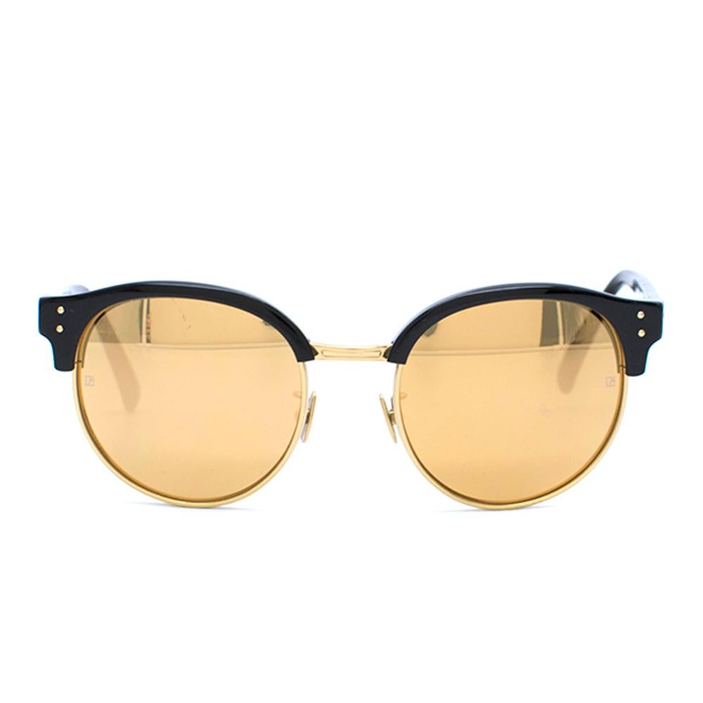 Linda Farrow Gold and Black Sunglasses 

Black frames are paired with gold gradient lenses,
Gold bridge,
100% UV protected ZEISS PURE lenses

Sunglasses case and cleaning cloth included.


Please note, these items are pre-owned and may show some