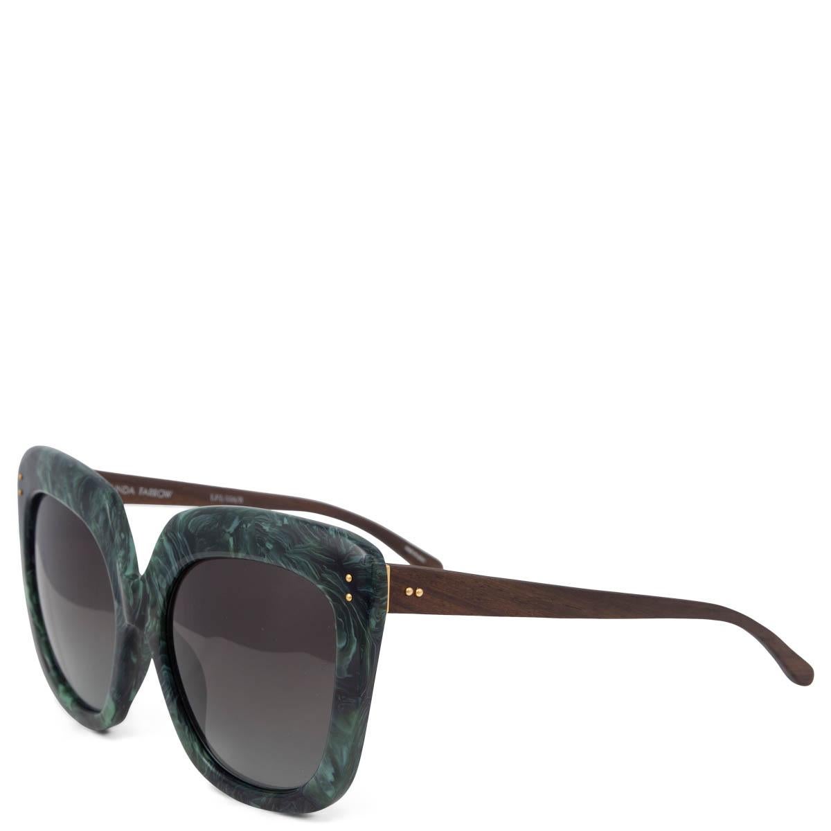 100% authentic Linda Farrow LFL/556/8 oversized sunglasses in green marble optic and green gradient lenses with brown wooden temples. Have been worn once and are in virtually new condition. Come with case. 

Measurements
Model	LFL/556/8
Width	15.5cm