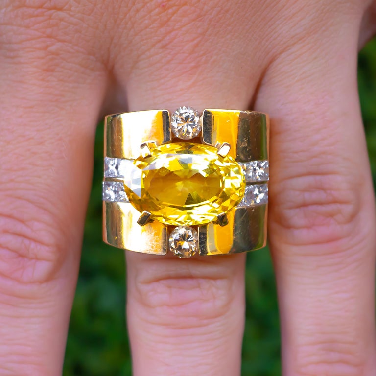 Brand: Linda Joslin

Very Fine Gold Sapphire = 12+ Carat

Champaign Diamonds = 0.60 Carats

White Diamonds = 0.90
Color: E
Clarity: VS

Metal: 18K Yellow Gold