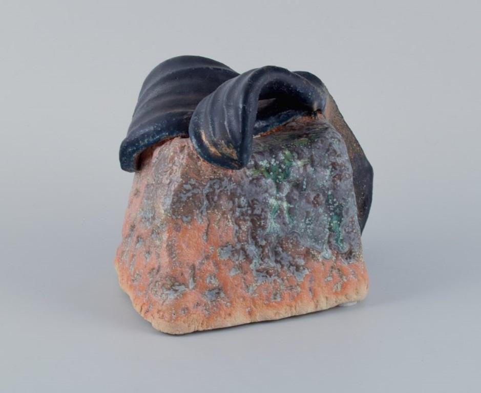 Linda Mathison, contemporary Swedish ceramic artist. 
Large organic-shaped ceramic sculpture with multicolored glaze.
Late 20th century.
Signed.
In excellent condition.
Dimensions: H 17.0 cm x L 19.0 cm x W 12.0 cm.